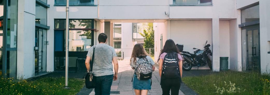 Faceless students in college grounds.jpg